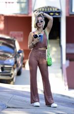 JOY CORRIGAN Waits for an Uber After a Meeting in Hollywood 07/15/2024