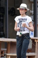 JULIANNA MARGUILES Out with Her Dog for Coffee in New York 07/15/2024