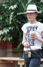 JULIANNA MARGUILES Out with Her Dog for Coffee in New York 07/15/2024