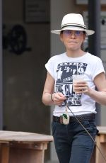 JULIANNA MARGUILES Out with Her Dog for Coffee in New York 07/15/2024