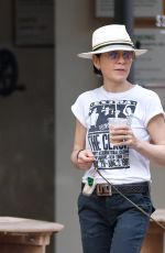 JULIANNA MARGUILES Out with Her Dog for Coffee in New York 07/15/2024