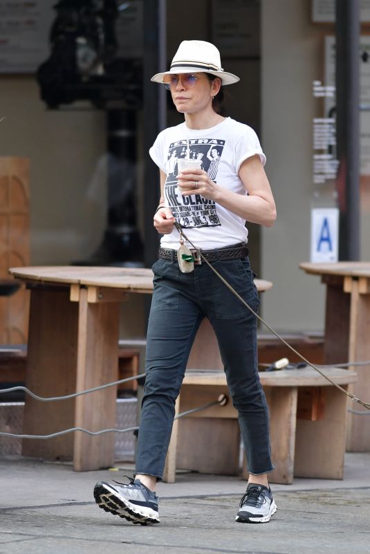 JULIANNA MARGUILES Out with Her Dog for Coffee in New York 07/15/2024