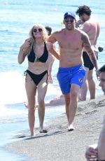 KATIE MCGLYNN in Bikini at a Beach in Santorini 07/15/2024