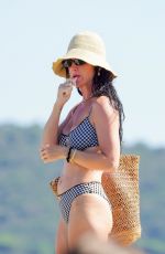 KATY PERRY in Bikini and Orlando Bloom at Club 55 in St-Tropez 07/15/2024