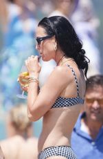 KATY PERRY in Bikini and Orlando Bloom at Club 55 in St-Tropez 07/15/2024