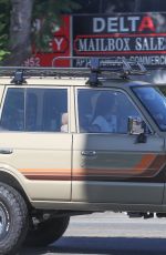 KENDALL JENNER Out for Morning Cruise in Her Vintage Toyota Land Cruiser SUV in Los Angeles 07/28/2024