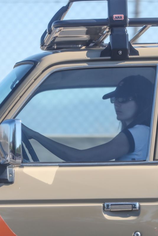 KENDALL JENNER Out for Morning Cruise in Her Vintage Toyota Land Cruiser SUV in Los Angeles 07/28/2024