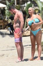 KERRY KATONA in Bikini and Ryan Mahoney at a Beach in Marbella 07/14/2024