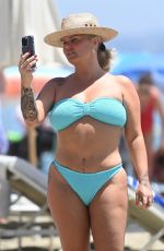 KERRY KATONA in Bikini and Ryan Mahoney at a Beach in Marbella 07/14/2024