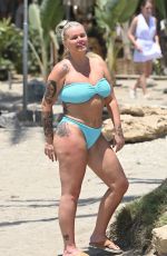 KERRY KATONA in Bikini and Ryan Mahoney at a Beach in Marbella 07/14/2024