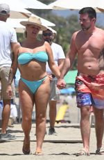 KERRY KATONA in Bikini and Ryan Mahoney at a Beach in Marbella 07/14/2024