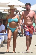 KERRY KATONA in Bikini and Ryan Mahoney at a Beach in Marbella 07/14/2024