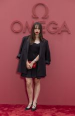 KIM HIGELIN at Opening Night of Omega House in Paris 07/27/2024
