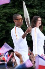 LAETITIA CASTA at 2024 Paris Olympic Games Torch Relayat Saint-Denis 07/26/2024