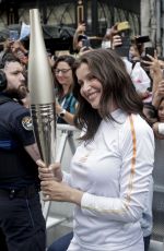 LAETITIA CASTA at 2024 Paris Olympic Games Torch Relayat Saint-Denis 07/26/2024