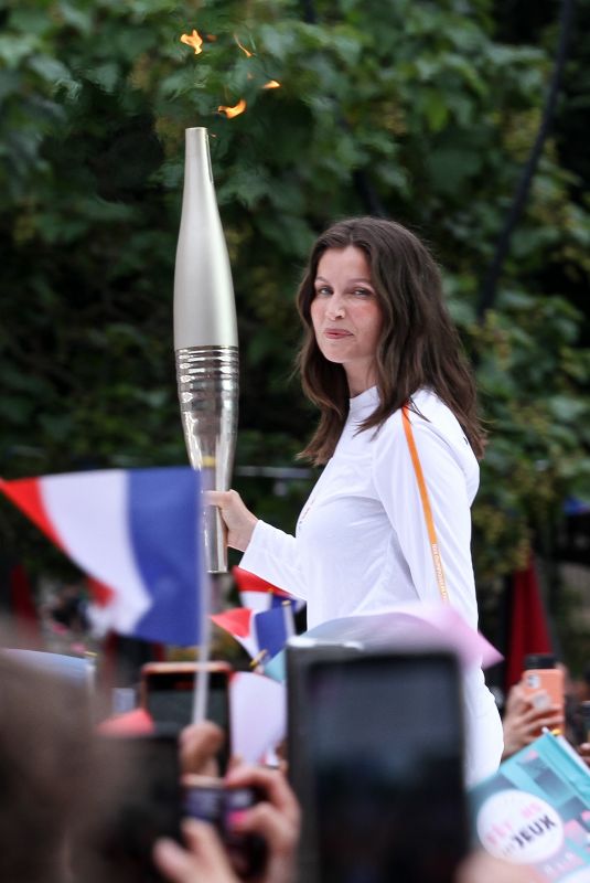 LAETITIA CASTA at 2024 Paris Olympic Games Torch Relayat Saint-Denis 07/26/2024