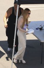 LINDSAY LOHAN Taking a Break on the Set of Freaky Friday in Los Angeles 07/15/2024