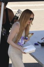 LINDSAY LOHAN Taking a Break on the Set of Freaky Friday in Los Angeles 07/15/2024