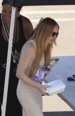 LINDSAY LOHAN Taking a Break on the Set of Freaky Friday in Los Angeles 07/15/2024