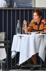 MAGGIE GYLLENHAAL Enjoys a Meal Al Fresco in New York 07/15/2024
