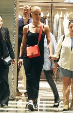 MICHELLE HUNZIKER Out Shopping at Armani in via Sant