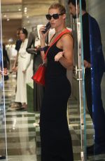 MICHELLE HUNZIKER Out Shopping at Armani in via Sant