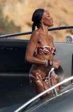 NAOMI CAMPBELL, MICHELLE RODRIGUEZ, EIZA GONZALEZ and AFEF JNIFEN in Bikinis on Holiday in Ibiza 07/09/2024