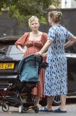 Pregnant KATE PHILLIPS Chatted to a Pal in London 07/20/2024