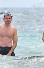 Pregnant MADIOSN HEADRICK in Swimsuit and Joe Nahmad on the Beach in St Tropez 07/21/2024