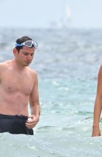 Pregnant MADIOSN HEADRICK in Swimsuit and Joe Nahmad on the Beach in St Tropez 07/21/2024