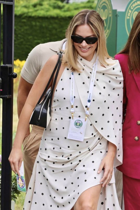 Pregnant MARGOT ROBBIE Arrives at Wimbledon in London 07/12/2024