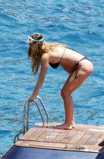 Pregnant NINA AGDAL in Bikini Celebrates Independence Day at a Yacht in Capri 07/04/2024
