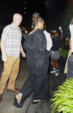 RIHANNA in Double Denim at a Photoshoot with ASAP Rocky at Mercer Hotel in New York 07/20/2024
