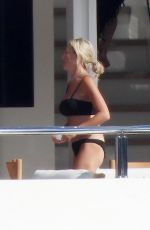 ROXY JACENKO and Oliver Curtis at a Family Break at a Yacht in Portofino 07/13/2024