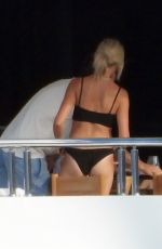 ROXY JACENKO and Oliver Curtis at a Family Break at a Yacht in Portofino 07/13/2024