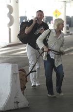SELMA BLAIR Arrives at LAX with Her Service Dog 07/27/2024