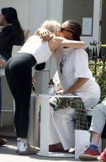 SIENNA MILLER and Oli Green Bumping in to a Pregnant ADWOA ABOAH at a Cafe in Notting Hill 07/17/2024