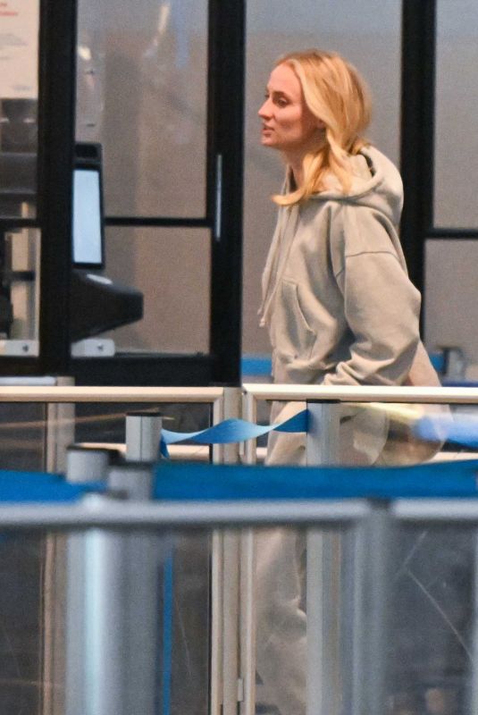 SOPHIE TURNER Arrives at JFK Airport in New York 07/7/2024
