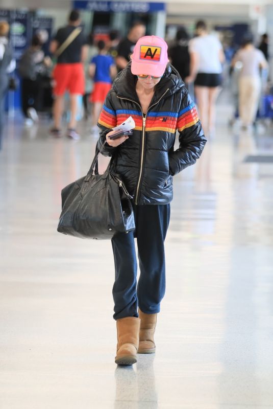 TARA REID Catches a Flight Out of Los Angeles 06/28/2024