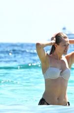 TONI GARRN and Joshua Phitoussi in Bikini at a Beach in St. Tropez 07/20/2024