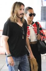 ZOE SALDANA and Marco Perego Zoe Arrives at Airport in Los Angeles 07/29/2024