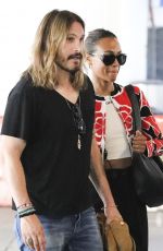 ZOE SALDANA and Marco Perego Zoe Arrives at Airport in Los Angeles 07/29/2024