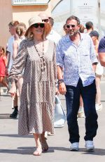 AMANDA LEAR and Bernard Montiel Leaves Le Senequier in Saint Tropez 08/03/2024