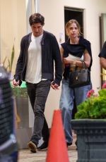 ASHLEY BENSON and Brandon Davis Out for Dinner at Sushi Park in West Hollywood 08/06/2024