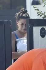 BRITTANY CATWRIGHT Greeting Uber Eats Delivery in Bikini in Los Angeles 08/27/2024