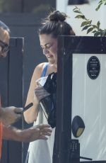 BRITTANY CATWRIGHT Greeting Uber Eats Delivery in Bikini in Los Angeles 08/27/2024