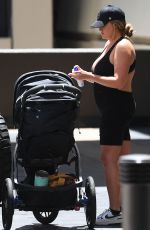 BRITTANY CATWRIGHT in Spandex Jumpsuit Out with Her Baby in Los Angeles 08/03/2024