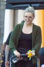 CAMERON DIAZ and Benji Madden Share a Kiss at a Restaurant in Montecito 08/26/2024