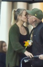 CAMERON DIAZ and Benji Madden Share a Kiss at a Restaurant in Montecito 08/26/2024