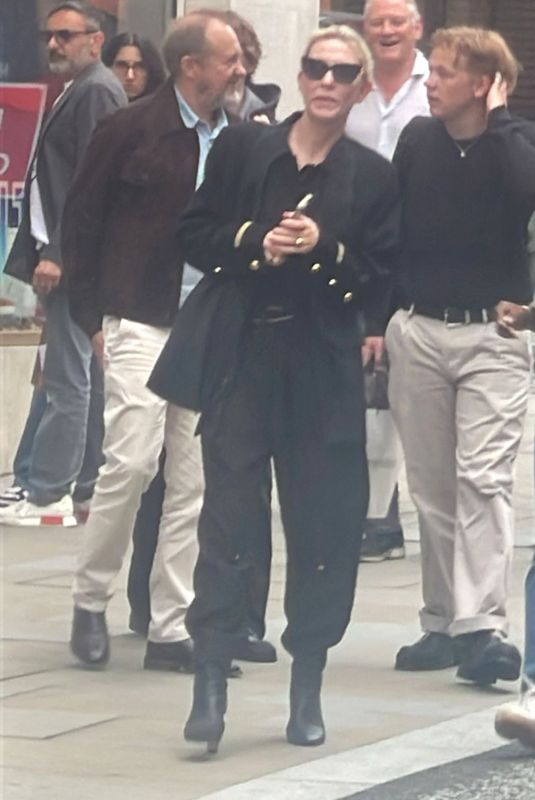 CATE BLANCHETT and Andrew Upton Out Hailing a Taxi in London 08/14/2024